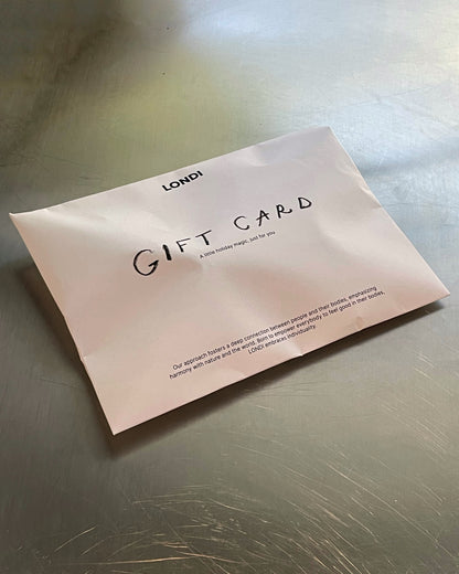 Подарункова картка LONDI з написом GIFT CARD і інформаційним текстом